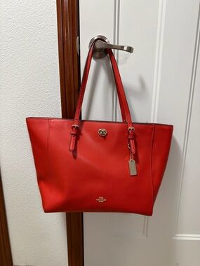 Coach Orange Leather Turn-Lock Tote with Gold Charm